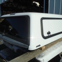 2015-2020, FORD F150 5.5' Bed. Camper Shell. It has Front Solid Window and Passenger Side Toolbox - /